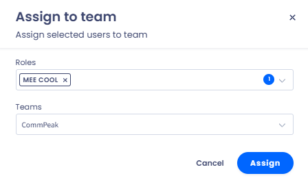 Screenshot of the dialog to assign a new team user, which highlights the 'Roles', and 'Teams' input fields and the 'Assign' and 'Cancel' buttons.