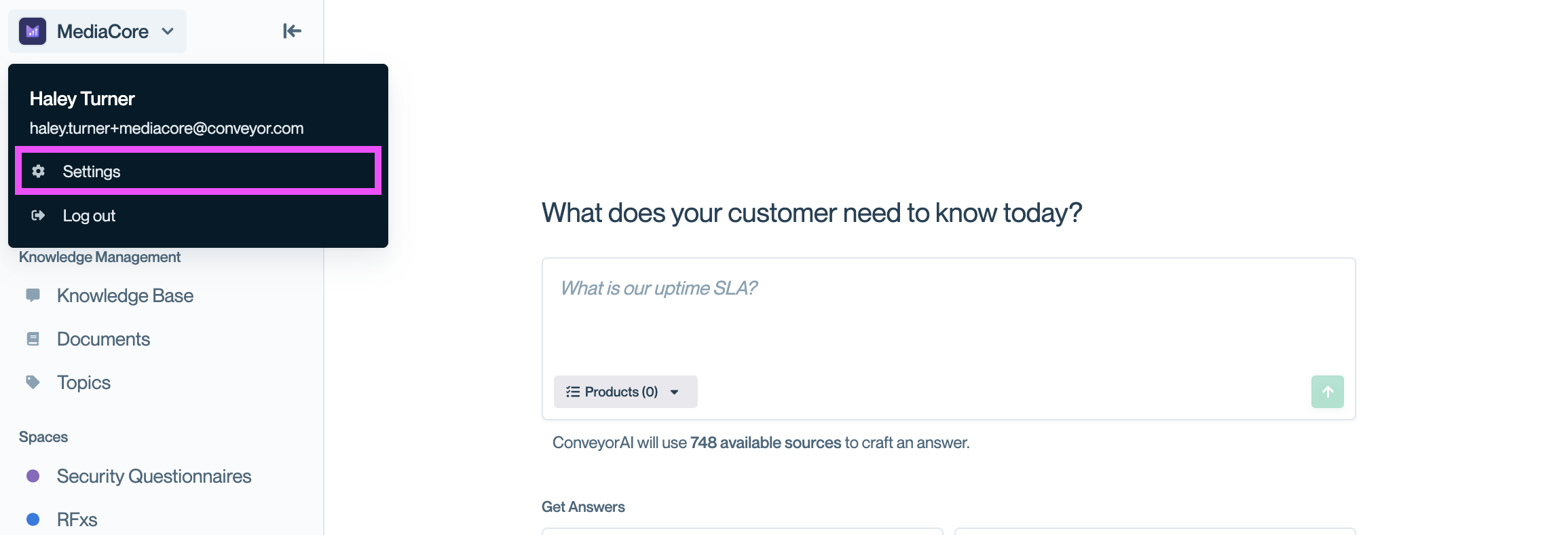 The Conveyor settings left navigation with 'Answers via Slack' selected under the Sales Self-Serve section.
