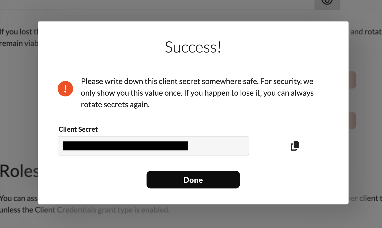 Success dialog showing the new client secret after rotation.