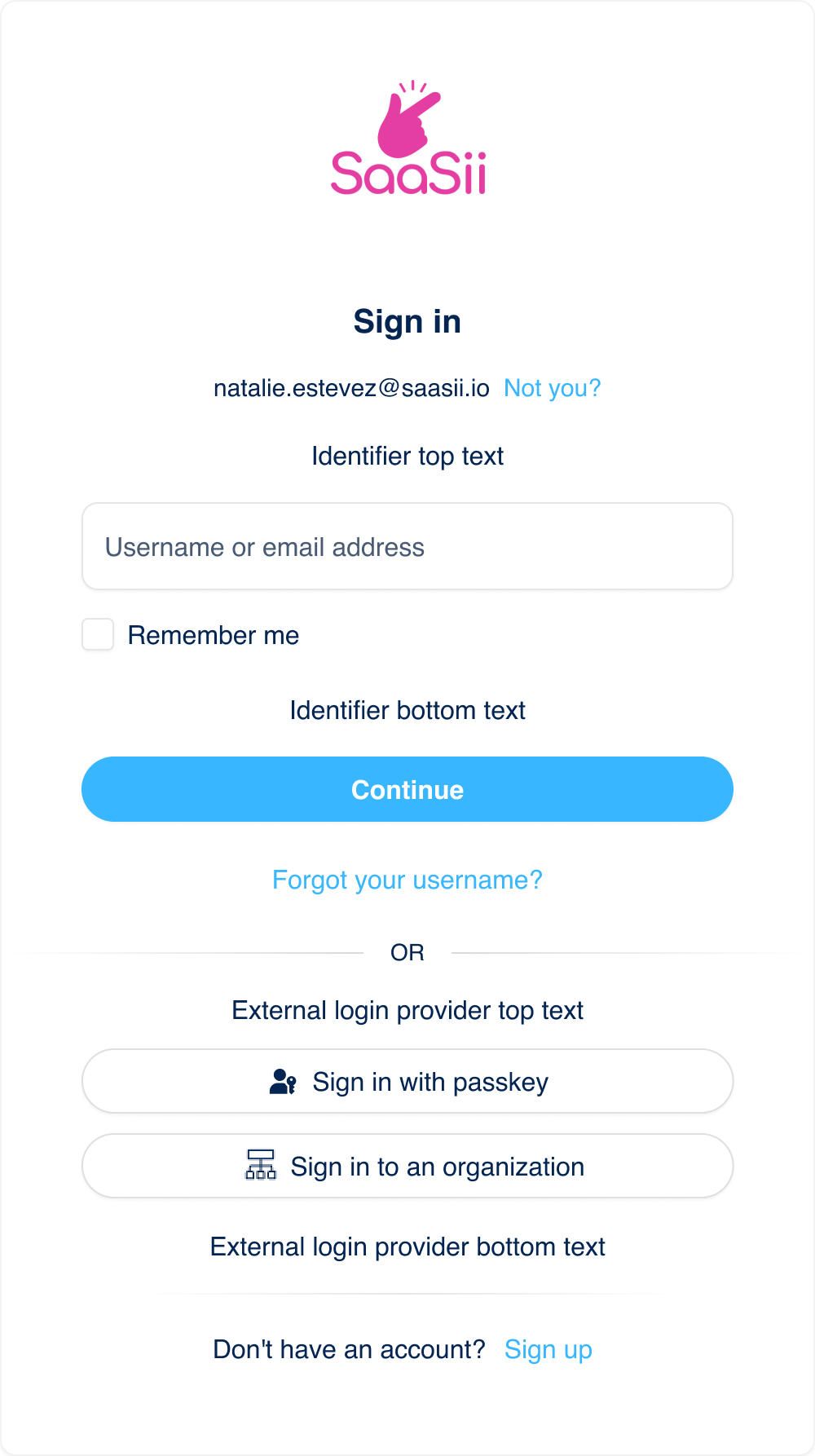 Screenshot of the identity input screen within the Identify step of the login journey. It includes a username or email input field, a “Remember me” checkbox, a “Continue” button, optional helper text areas above and below the input, and additional external login options such as “Sign in with passkey” and “Sign in to an organization.” Links for “Forgot your username?” and “Sign up” are also visible.