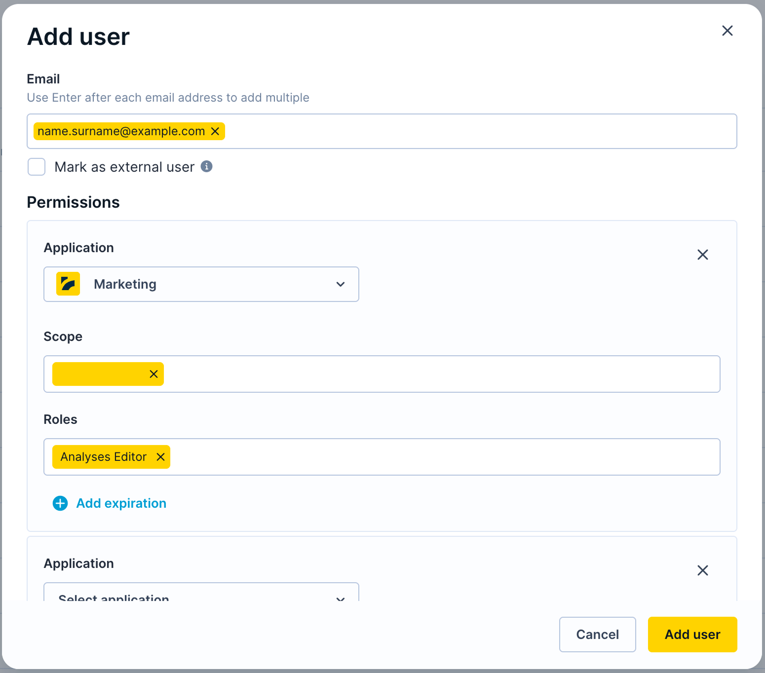 Completed user form showing email address, workspace selection with multiple projects, and assigned roles