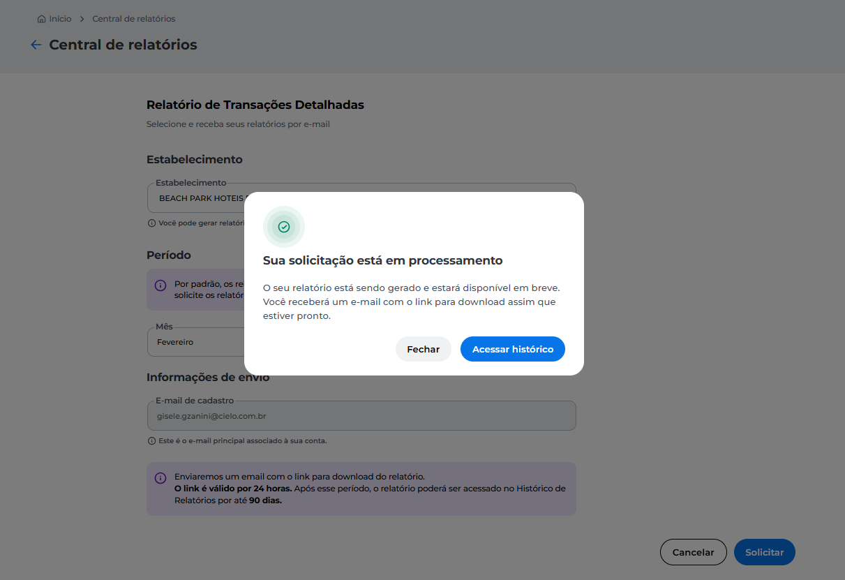 Mensagem de confirmação exibida na Central de Relatórios indicando que a solicitação está em processamento, com aviso de envio de e-mail contendo o link para download assim que o relatório estiver pronto.