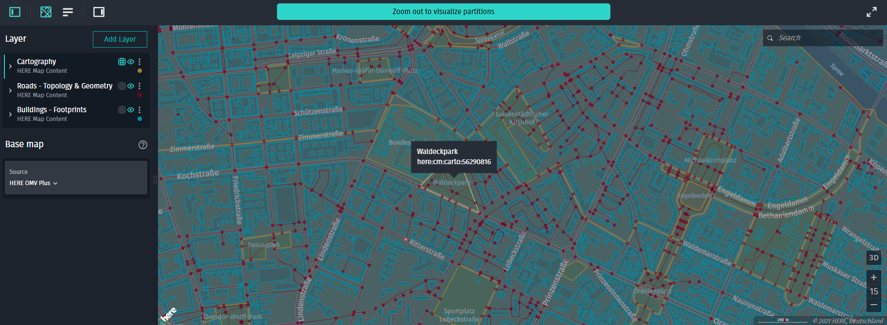 Cartographic data (yellow) overlaid on top of road topology data (red) and building footprints (blue)