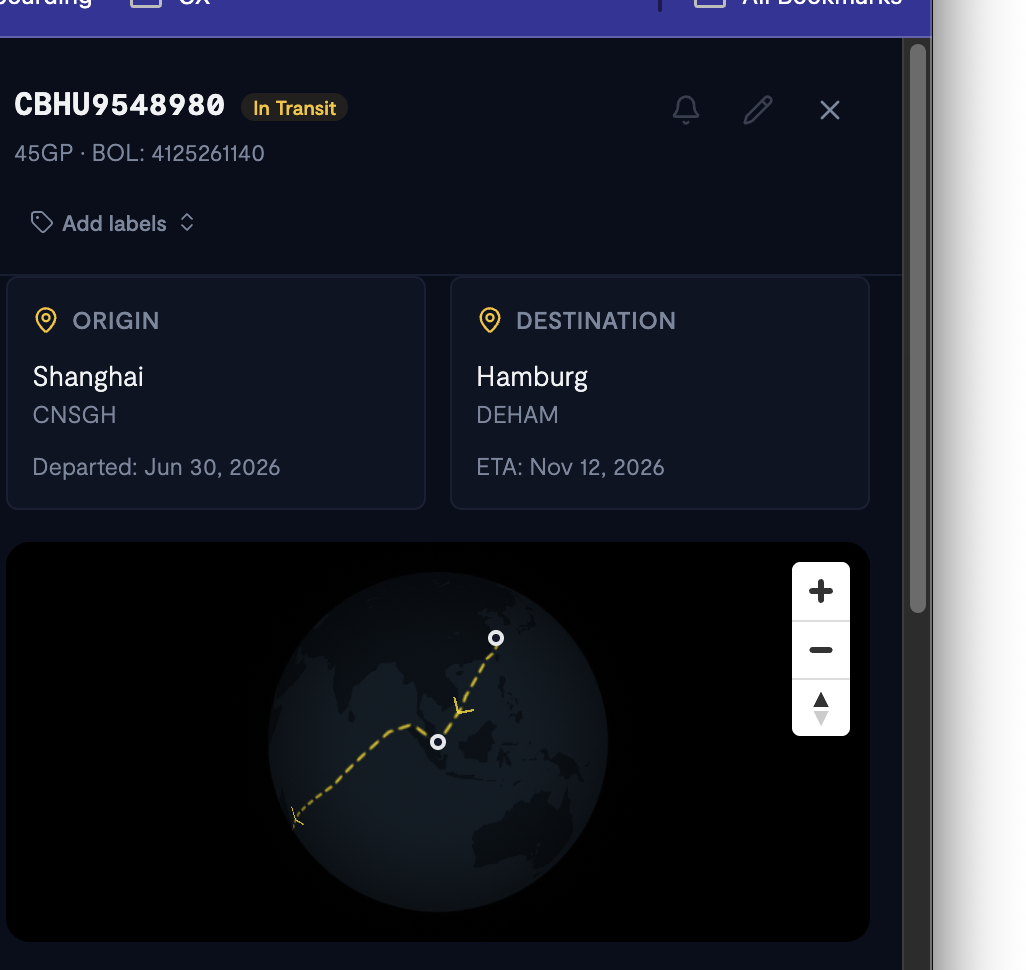 Screenshot: Close-up of the interactive map/globe showing the plotted route line from origin to destination with the vessel icon at its current position