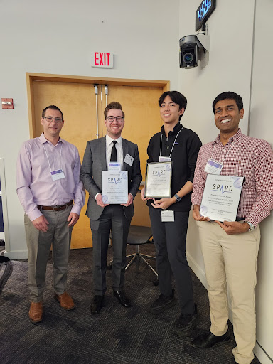 Shown left to right, Dr. Andrew Weitz, Program Director at NIH/NIBIB and SPARC Program Officer, and Emerging Scientist winners Shane Bender, Jichu (Michael) Zhang, and Dr. Naveen Jayaprakash. Photo by Sue Tappan