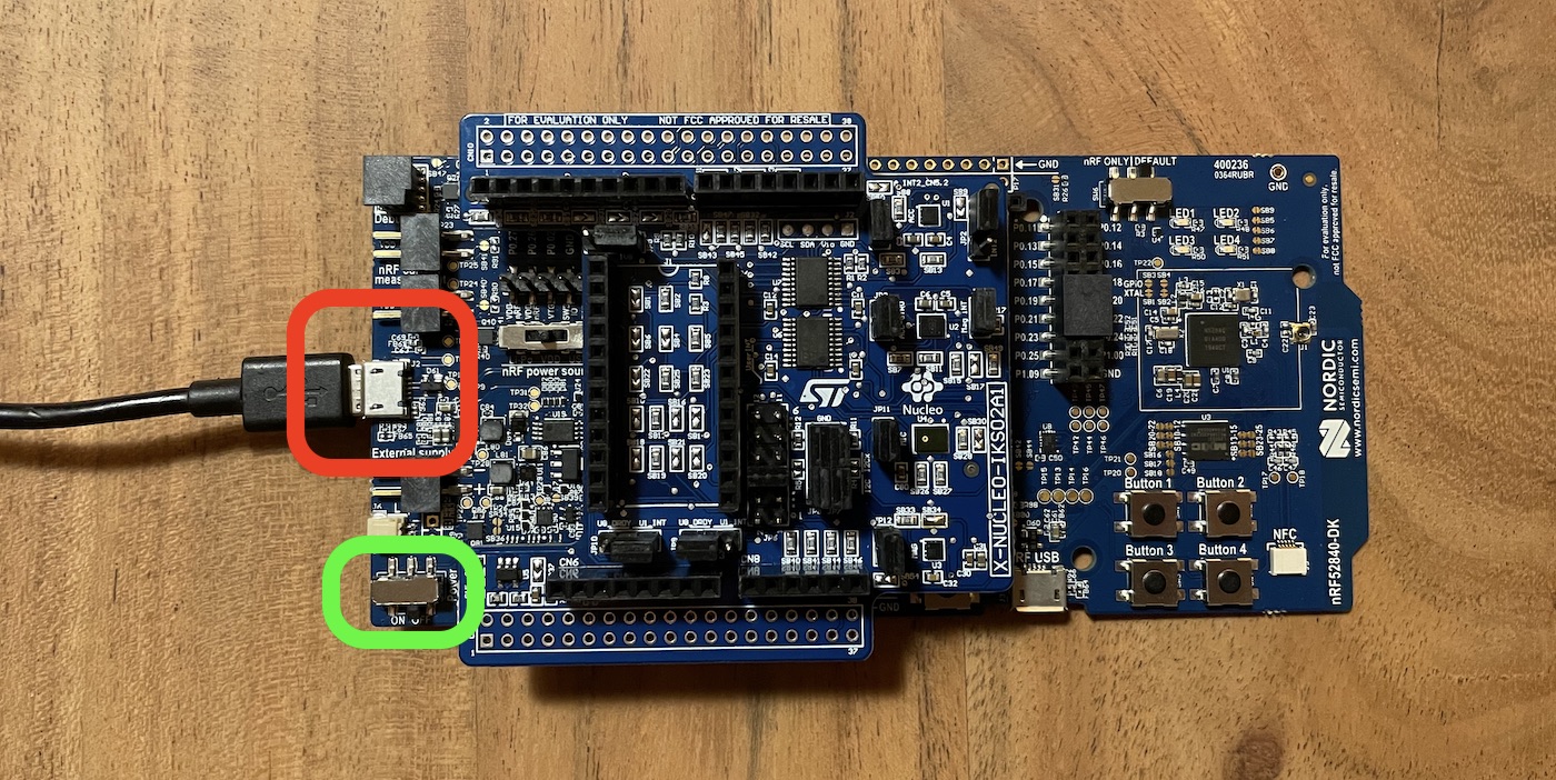 Connect a micro USB cable to the short USB port on the short side of the board (red). Make sure the power switch is toggled on.