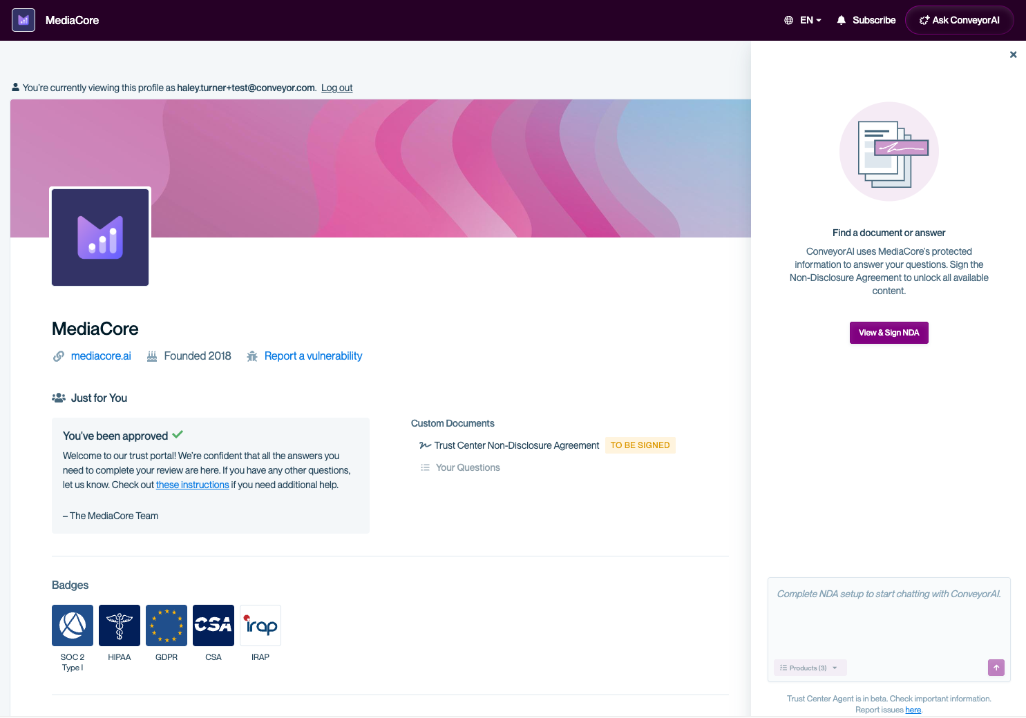 Trust Center page for “MediaCore” showing a visitor who has not yet signed the NDA. The right-side Trust Center Agent panel displays a message explaining that ConveyorAI uses protected information to answer questions and requires signing the Non-Disclosure Agreement to unlock all content. A “View & Sign NDA” button is visible, and the footer shows a disabled chat input with the message “Complete NDA setup to start chatting with ConveyorAI.”