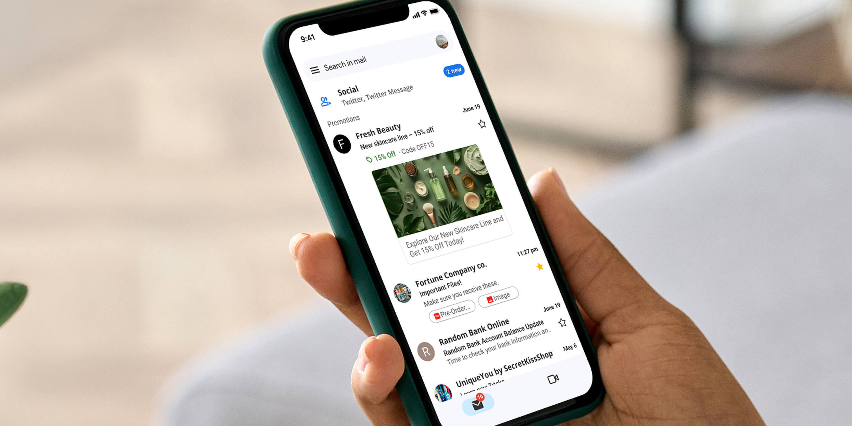 Person holding a smartphone showing Gmail Promotions tab with a highlighted email featuring a skincare product image, special offer, and promotional details.