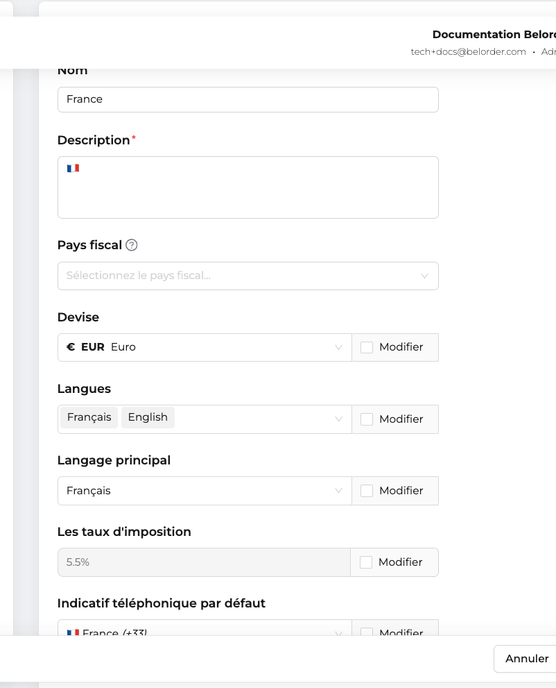 Formulaire Informations de base d'une région : champs Nom, Description, Pays fiscal, Devise, Langues, Langage principal, Les taux d'imposition et Indicatif téléphonique, chacun avec sa case Modifier
