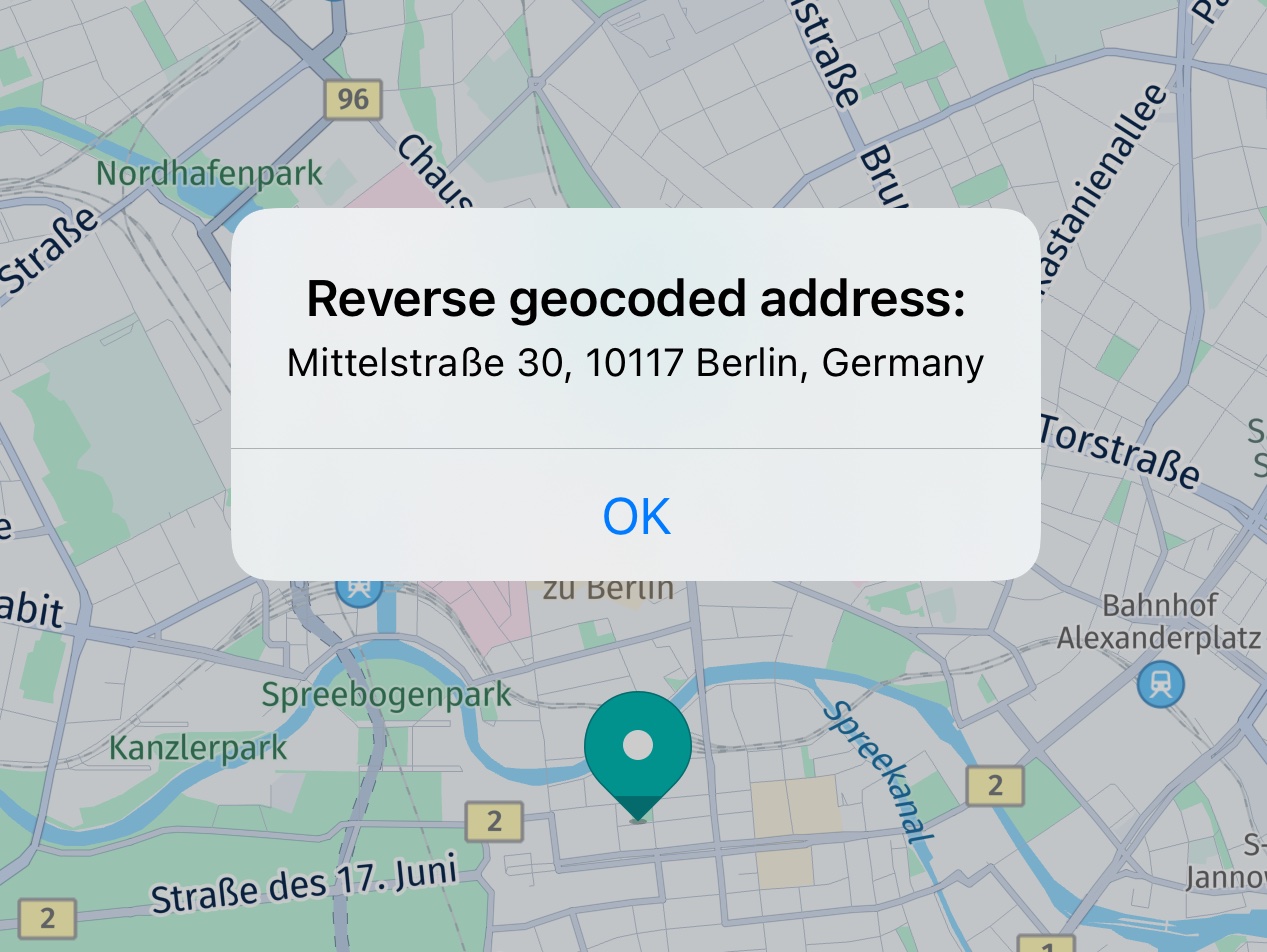 Screenshot: Showing a long press coordinate resolved to an address.