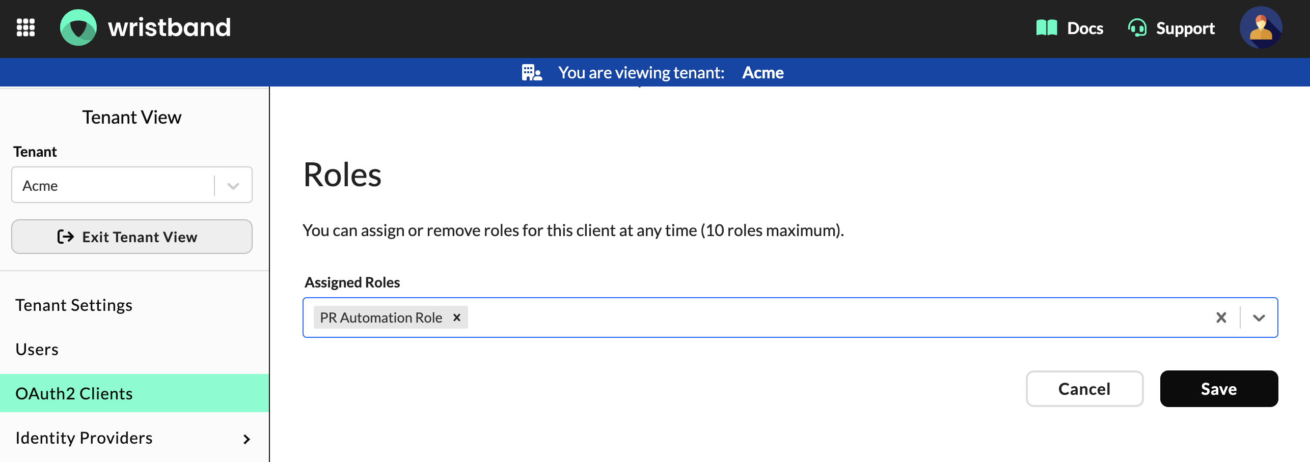 Roles section on the Edit Client page for a tenant-level M2M client showing the Assigned Roles multi-select dropdown.