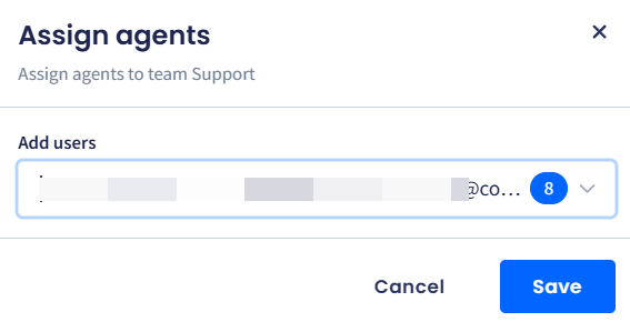 A screenshot of the dialog showing a message to confirm assigning an agent to an inbox team 'CommPeak' and the 'Save' and 'Cancel' buttons.