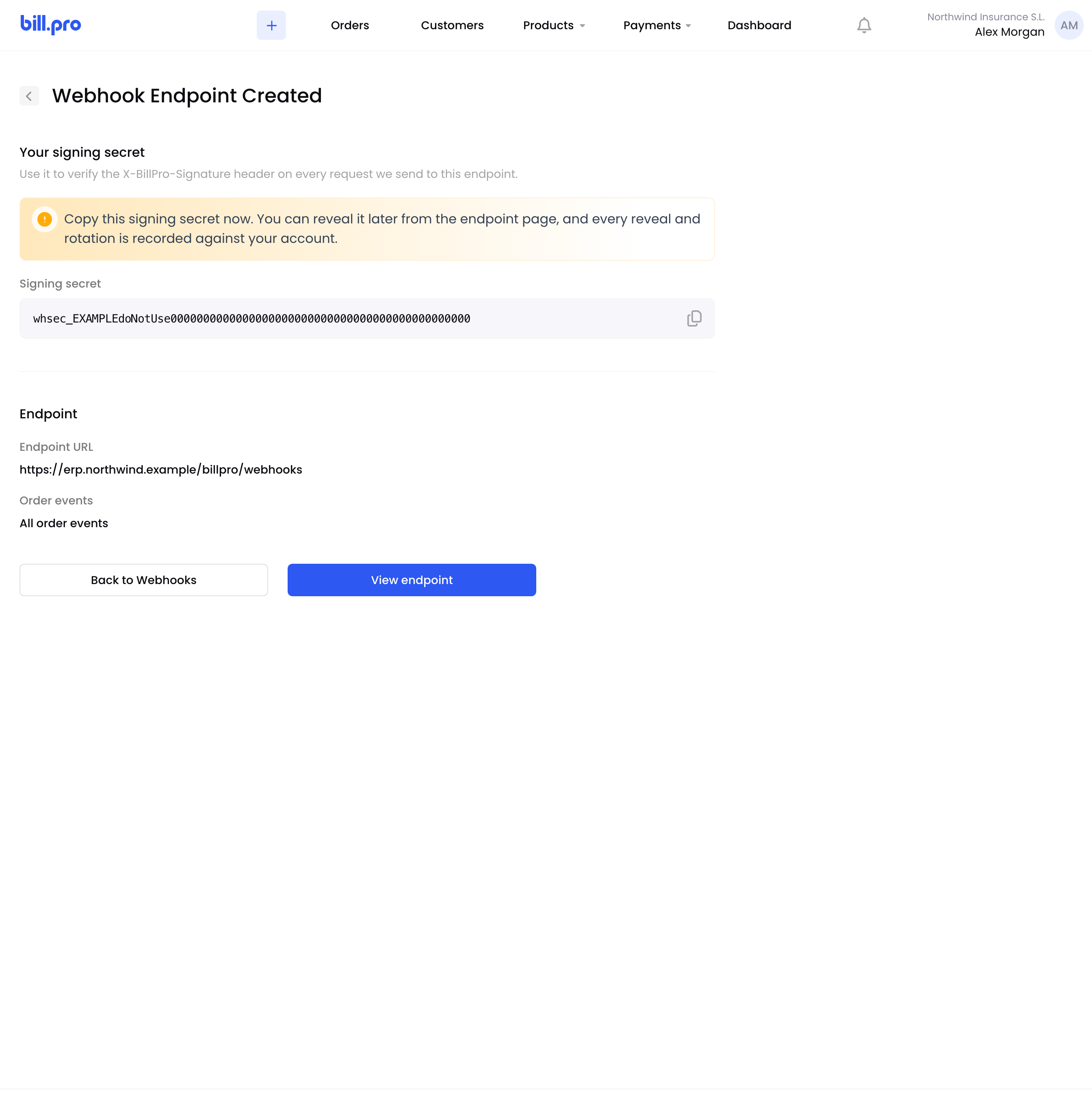 The Webhook Endpoint Created screen with an example signing secret