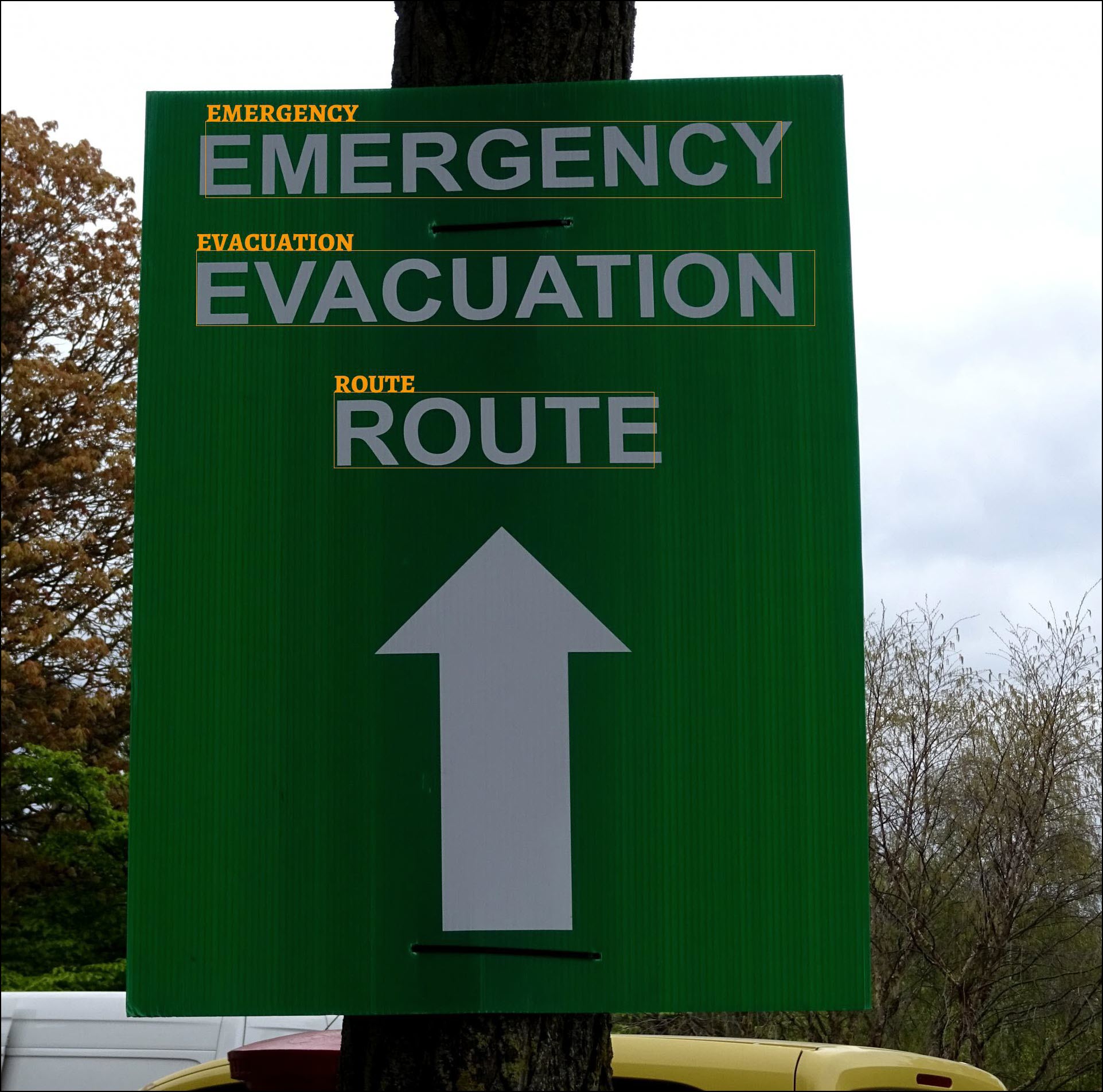emergency-evacuation-route-signpost_ocr.jpg 1923