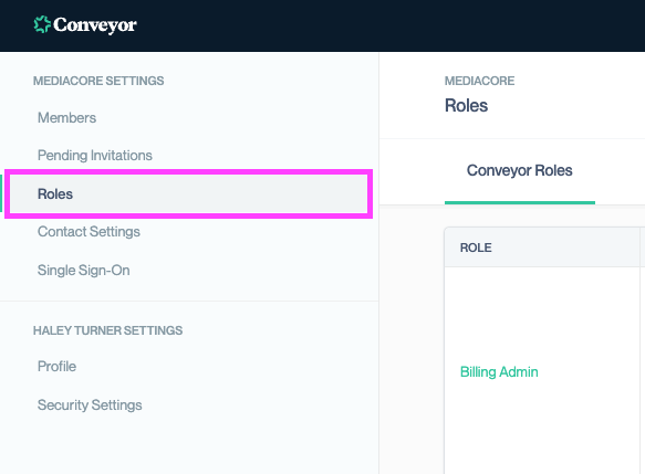 Conveyor Account Management settings panel open. The ‘Roles’ option is highlighted in pink on the left menu under Account Settings.