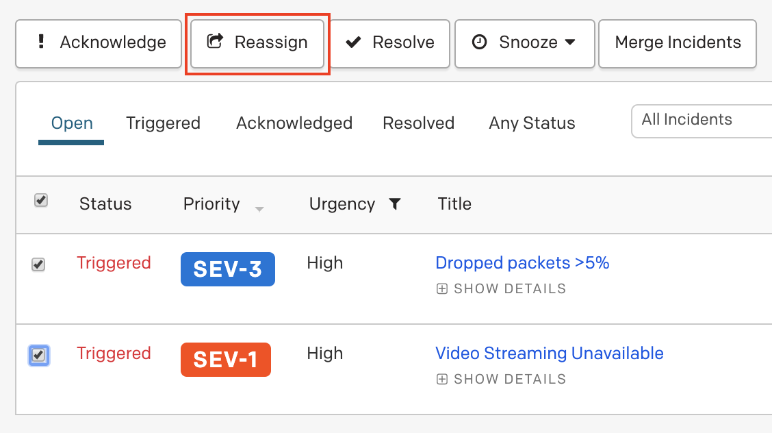 A screenshot of the PagerDuty web app showing how to reassign multiple incidents